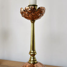 A Pair of Arts & Crafts Candlesticks