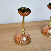 A Pair of Arts & Crafts Candlesticks