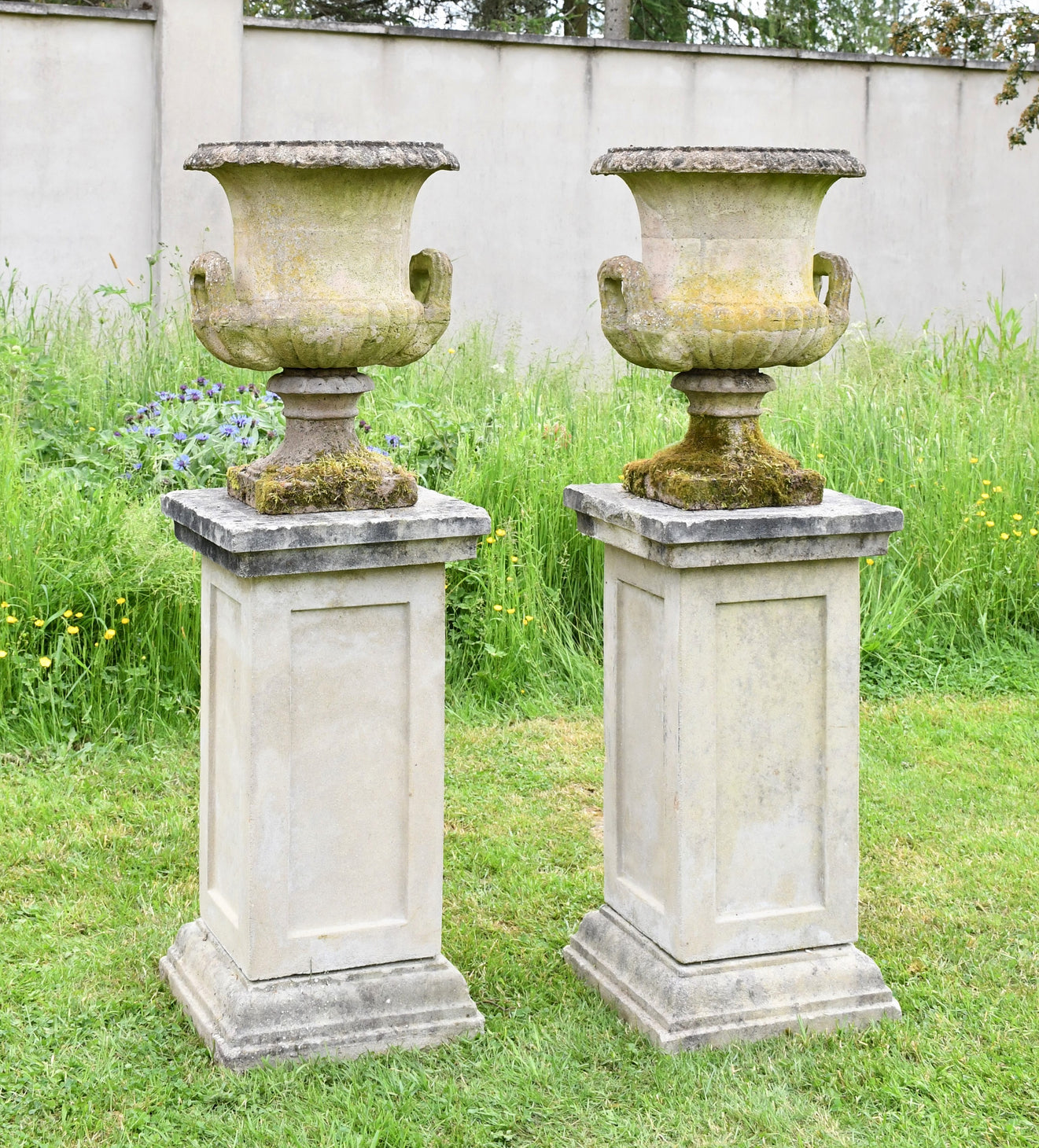 A Pair of Vintage Garden Urns on Haddonstone Plinths