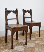 A Pair of Gothic Hall Chairs