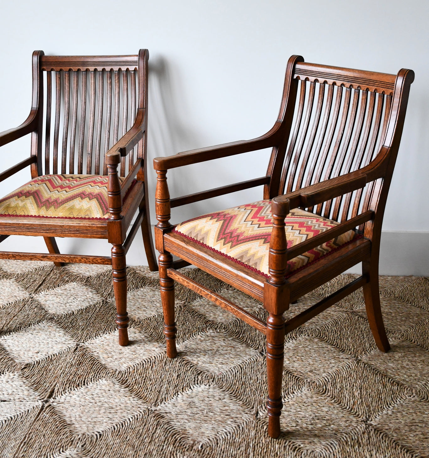A Pair of Late 19th Century - JAS Shoolbred Armchairs